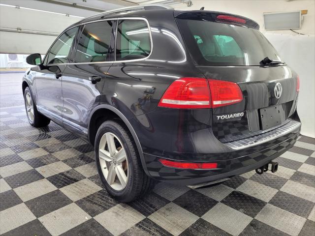 used 2014 Volkswagen Touareg Hybrid car, priced at $15,895