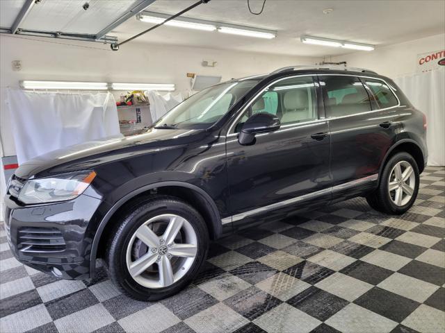 used 2014 Volkswagen Touareg Hybrid car, priced at $15,895