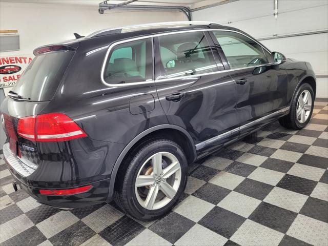 used 2014 Volkswagen Touareg Hybrid car, priced at $15,895