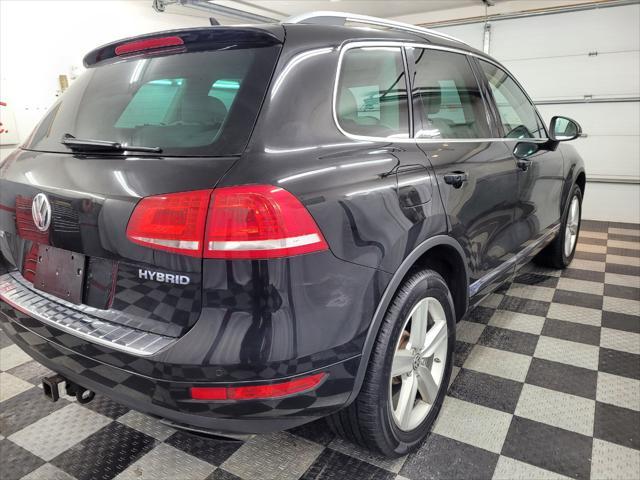 used 2014 Volkswagen Touareg Hybrid car, priced at $15,895