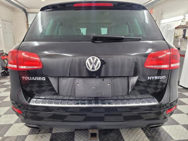 used 2014 Volkswagen Touareg Hybrid car, priced at $15,895