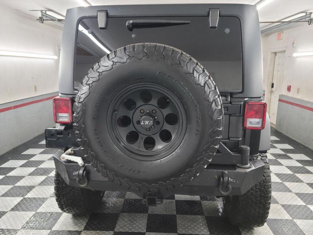 used 2011 Jeep Wrangler Unlimited car, priced at $13,995