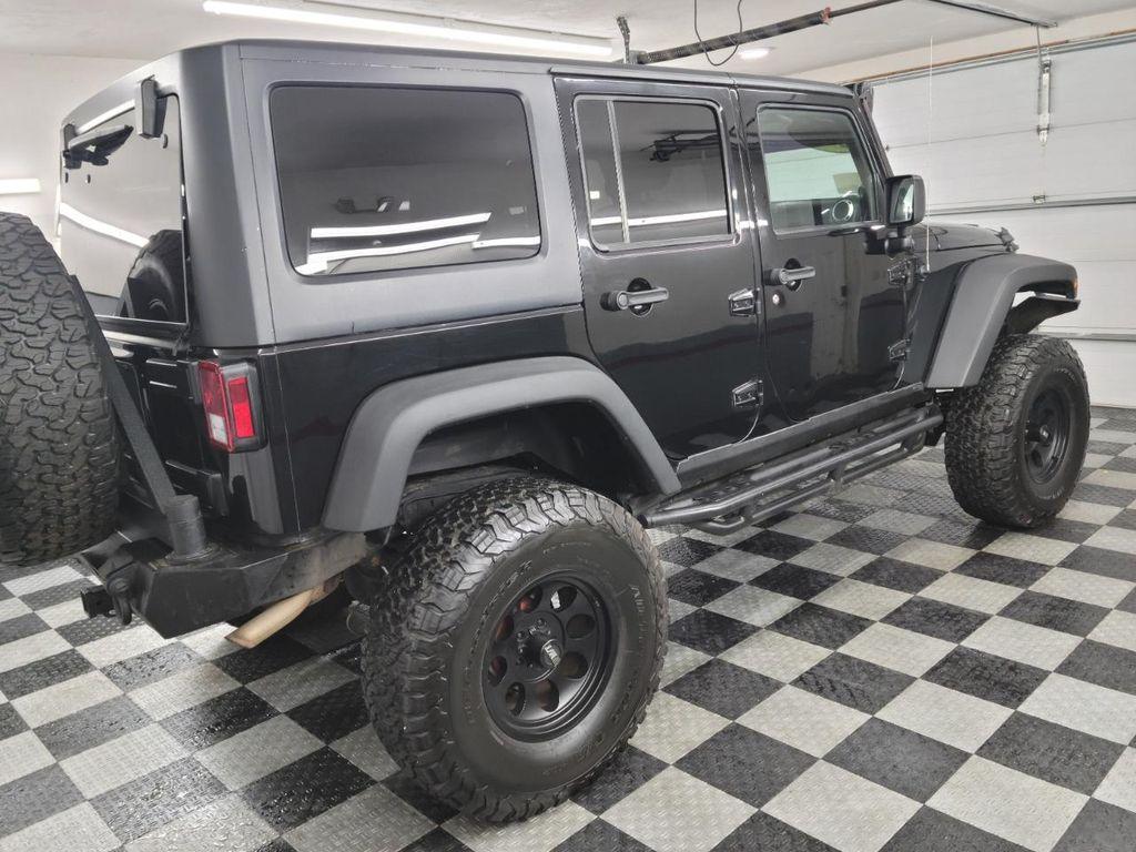 used 2011 Jeep Wrangler Unlimited car, priced at $13,995