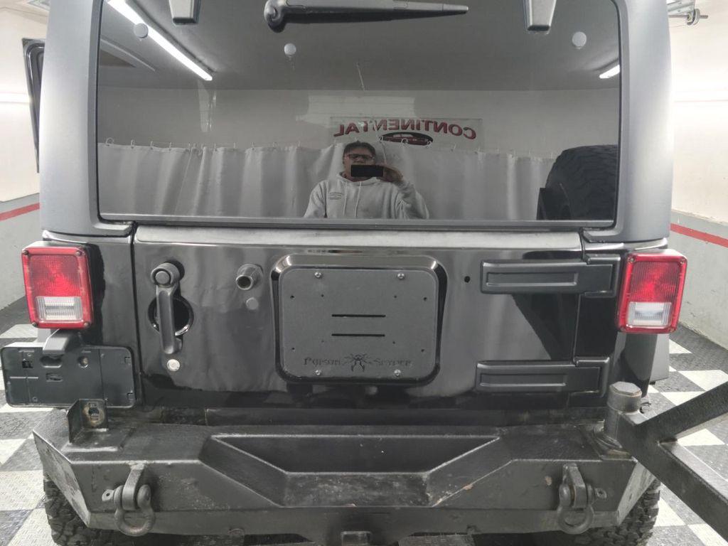 used 2011 Jeep Wrangler Unlimited car, priced at $13,995