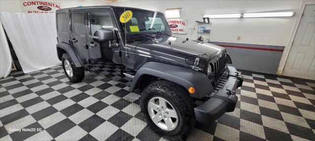 used 2011 Jeep Wrangler Unlimited car, priced at $18,995