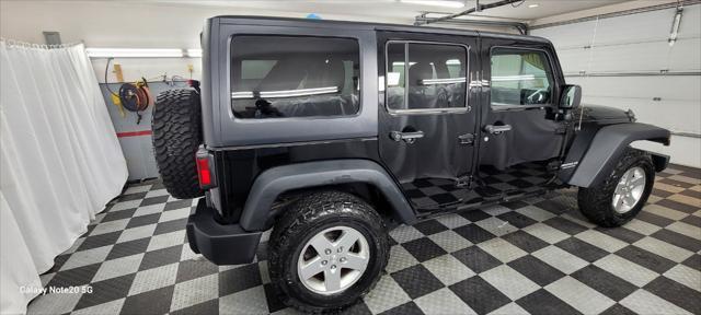 used 2011 Jeep Wrangler Unlimited car, priced at $18,995