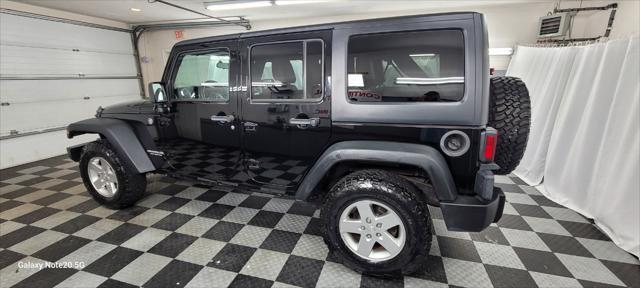 used 2011 Jeep Wrangler Unlimited car, priced at $18,995