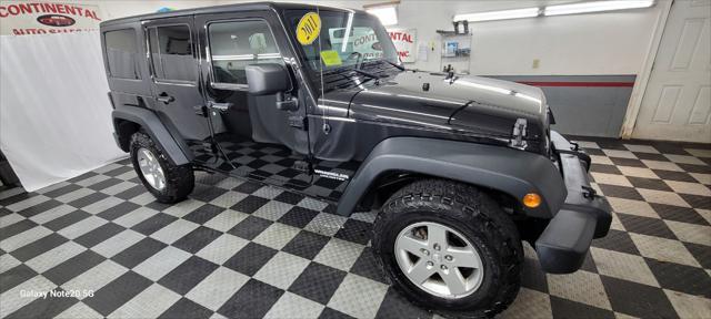 used 2011 Jeep Wrangler Unlimited car, priced at $18,995