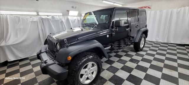 used 2011 Jeep Wrangler Unlimited car, priced at $18,995