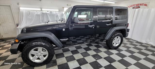 used 2011 Jeep Wrangler Unlimited car, priced at $18,995