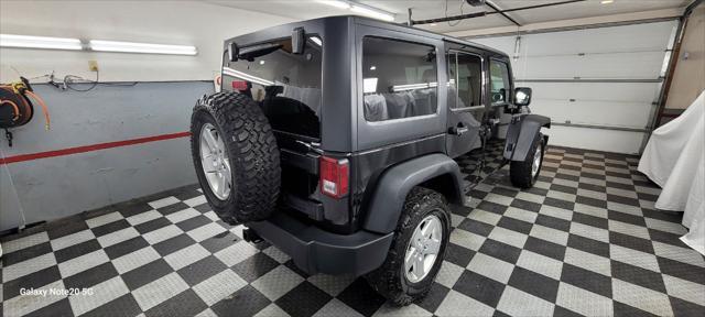 used 2011 Jeep Wrangler Unlimited car, priced at $18,995