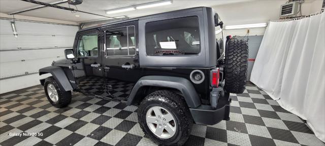 used 2011 Jeep Wrangler Unlimited car, priced at $18,995