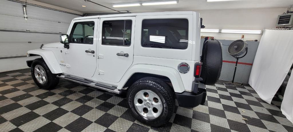 used 2014 Jeep Wrangler Unlimited car, priced at $19,495