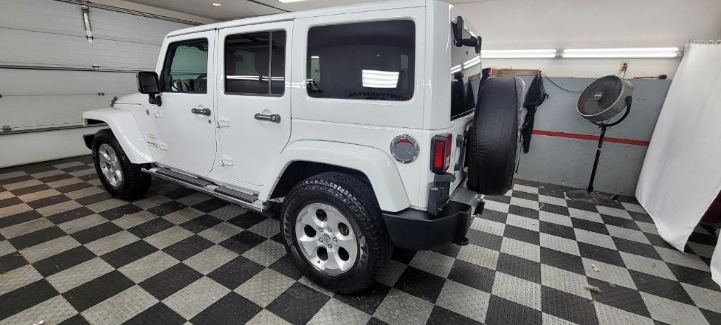 used 2014 Jeep Wrangler Unlimited car, priced at $19,495