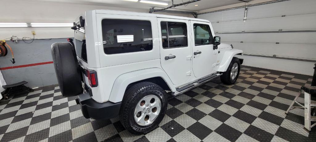 used 2014 Jeep Wrangler Unlimited car, priced at $19,495