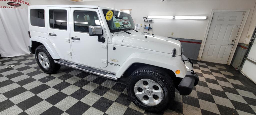 used 2014 Jeep Wrangler Unlimited car, priced at $19,495