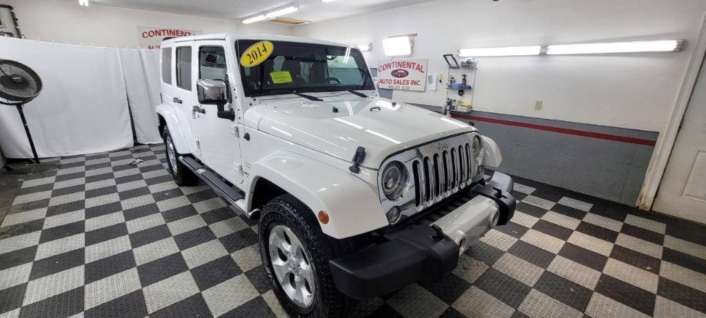 used 2014 Jeep Wrangler Unlimited car, priced at $19,495