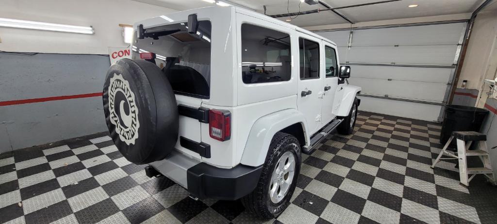 used 2014 Jeep Wrangler Unlimited car, priced at $19,495