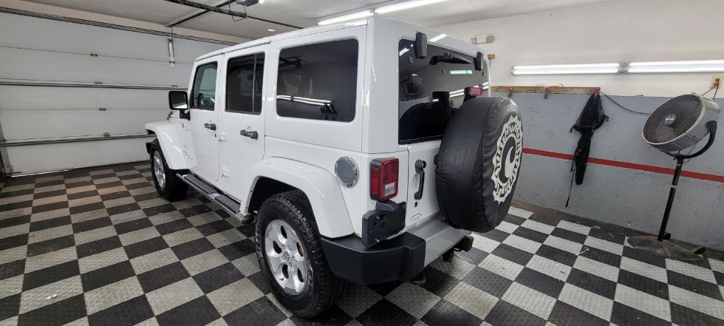 used 2014 Jeep Wrangler Unlimited car, priced at $19,495