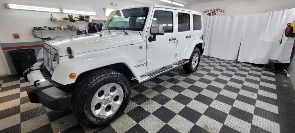 used 2014 Jeep Wrangler Unlimited car, priced at $19,495