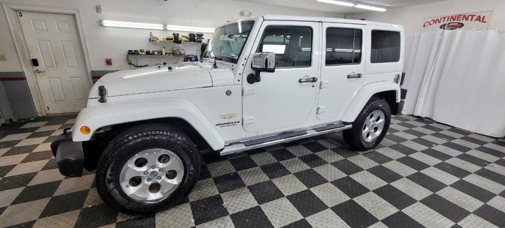 used 2014 Jeep Wrangler Unlimited car, priced at $19,495