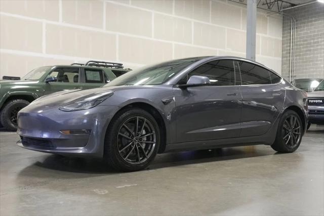used 2023 Tesla Model 3 car, priced at $24,391
