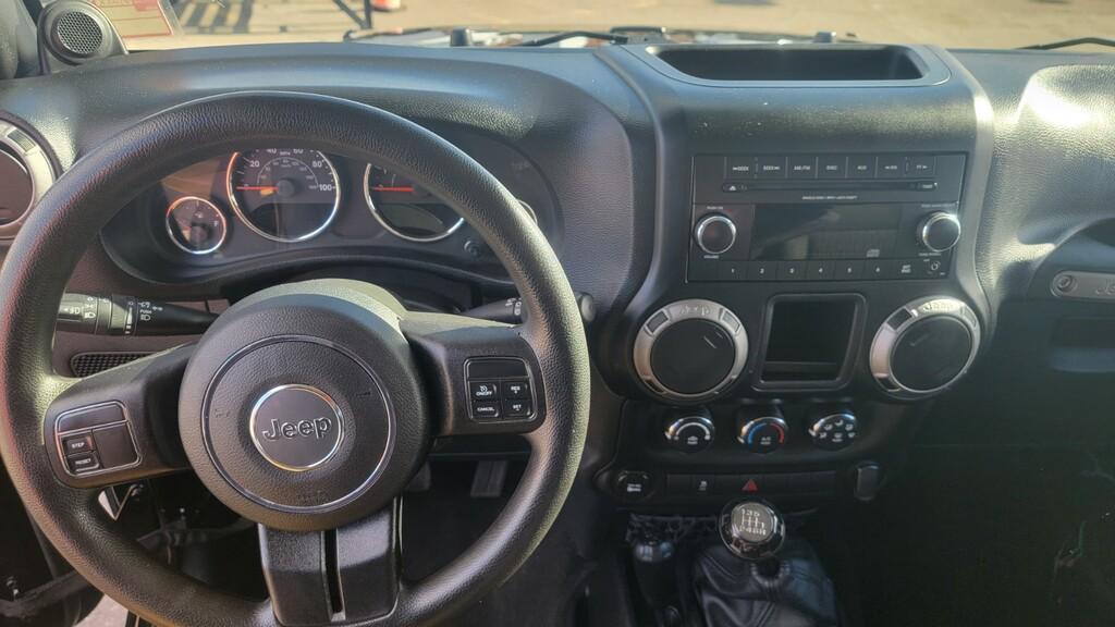 used 2012 Jeep Wrangler Unlimited car, priced at $18,999