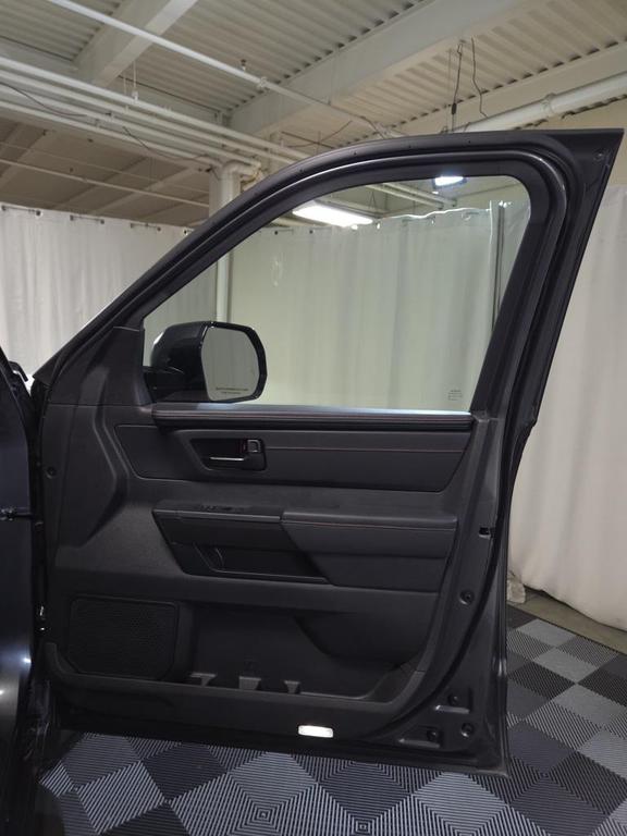 used 2025 Toyota Tundra Hybrid car, priced at $74,200