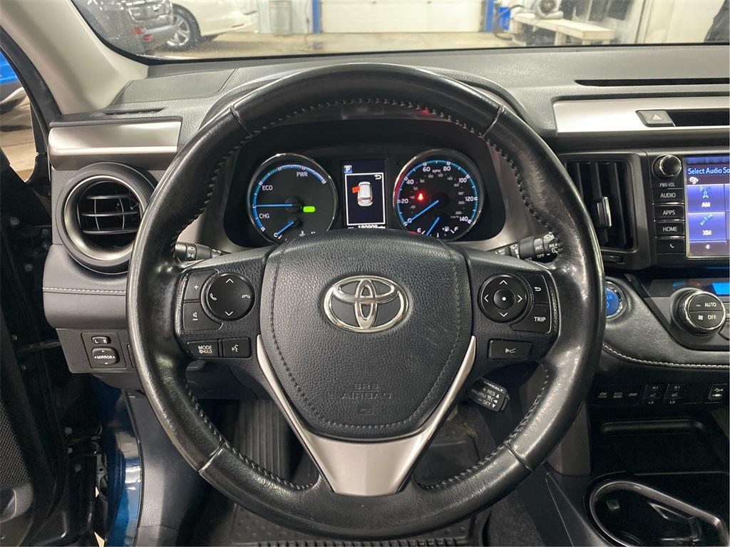 used 2018 Toyota RAV4 Hybrid car, priced at $14,000