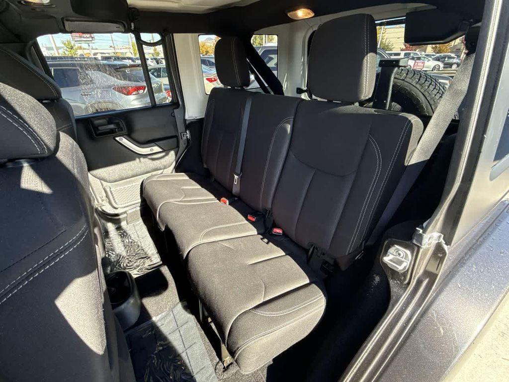 used 2018 Jeep Wrangler JK Unlimited car, priced at $23,857