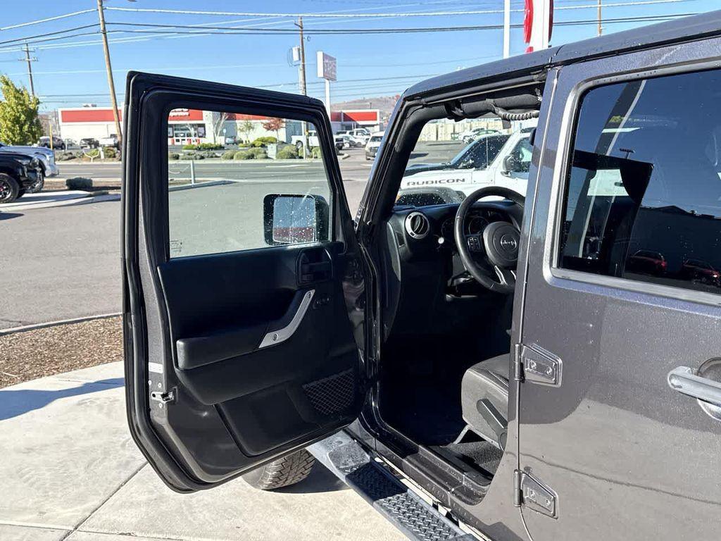 used 2018 Jeep Wrangler JK Unlimited car, priced at $23,857