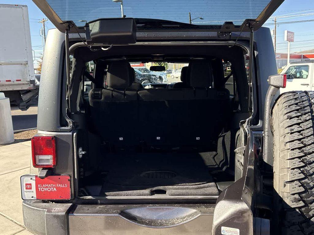 used 2018 Jeep Wrangler JK Unlimited car, priced at $23,857