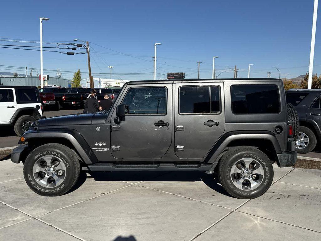 used 2018 Jeep Wrangler JK Unlimited car, priced at $23,857
