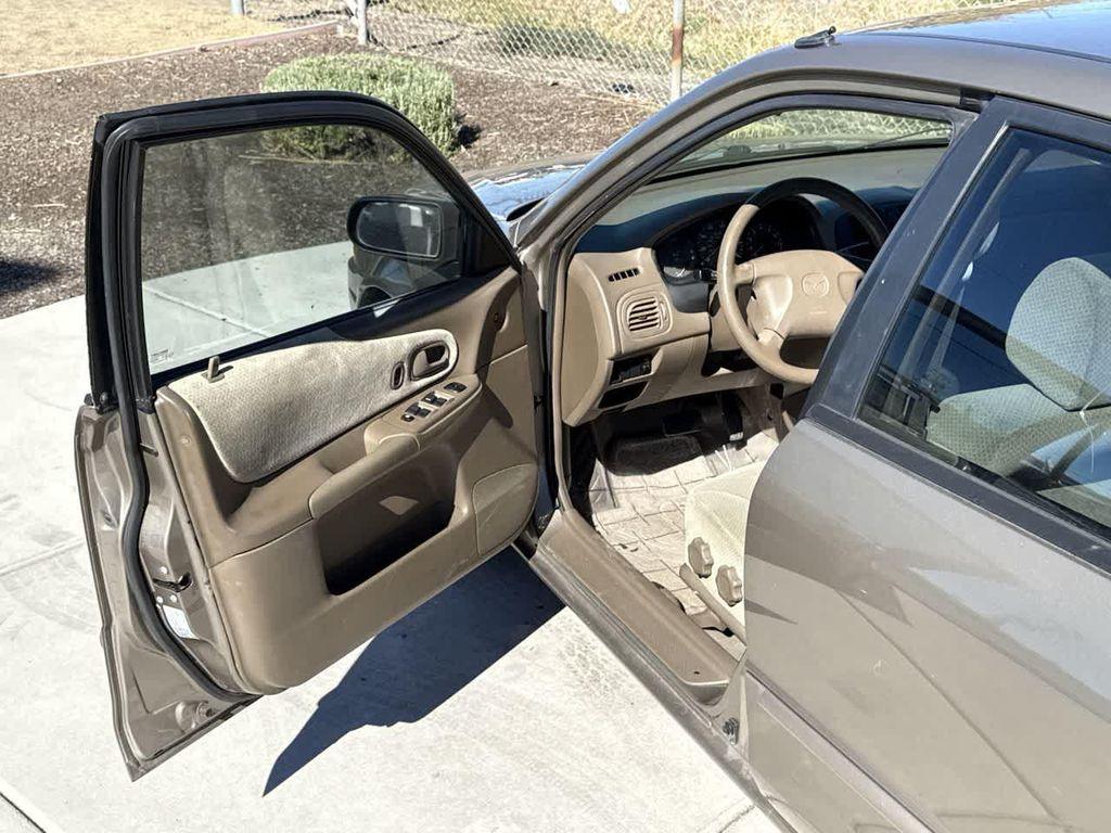 used 1999 Mazda Protege car, priced at $4,877
