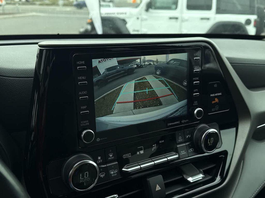 used 2022 Toyota Highlander Hybrid car, priced at $28,462