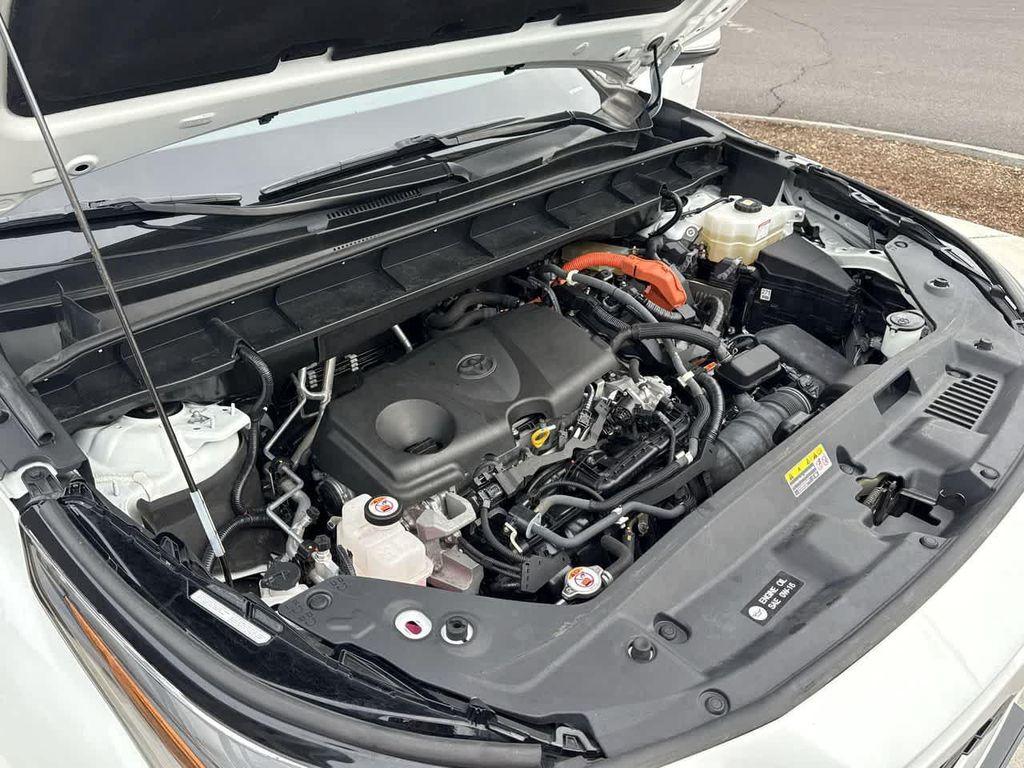 used 2022 Toyota Highlander Hybrid car, priced at $28,462