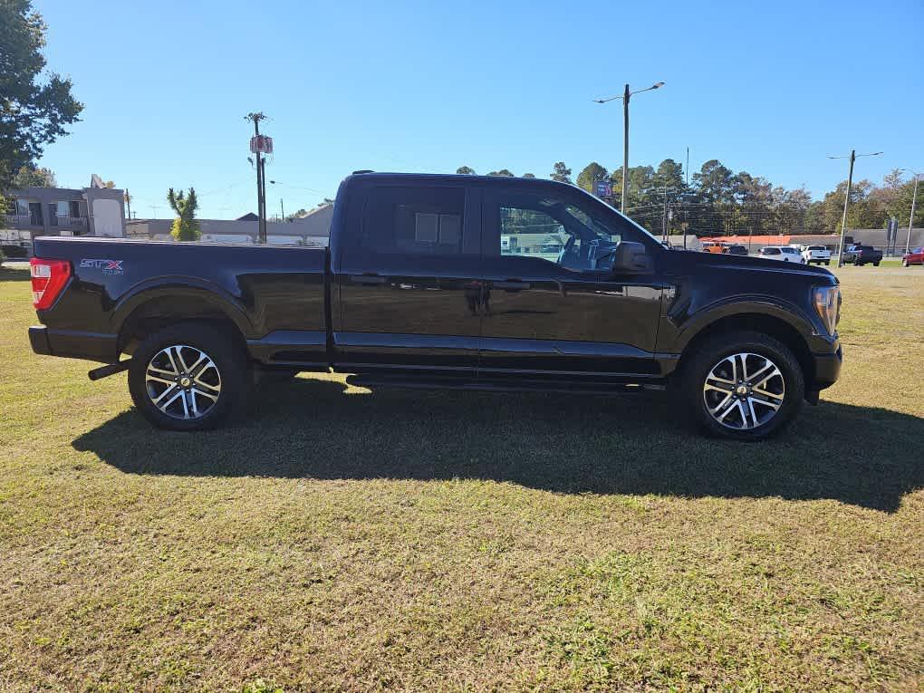 used 2023 Ford F-150 car, priced at $36,587