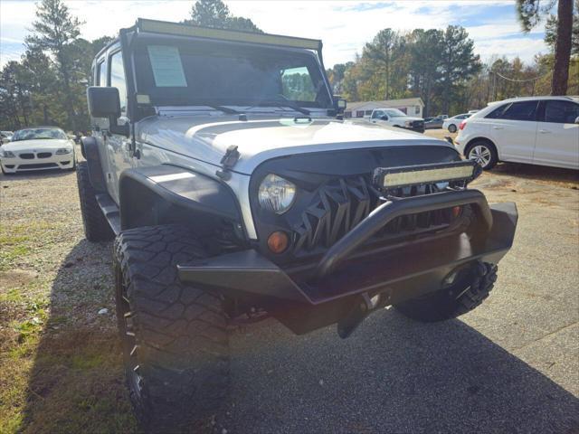 used 2012 Jeep Wrangler Unlimited car, priced at $13,999