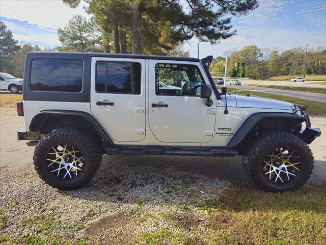 used 2012 Jeep Wrangler Unlimited car, priced at $13,999