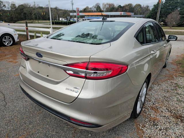 used 2018 Ford Fusion Hybrid car, priced at $9,999