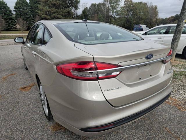 used 2018 Ford Fusion Hybrid car, priced at $9,999