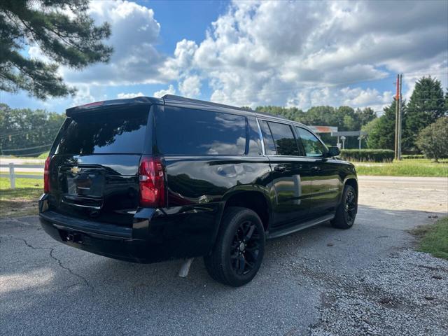 used 2015 Chevrolet Suburban car, priced at $14,499