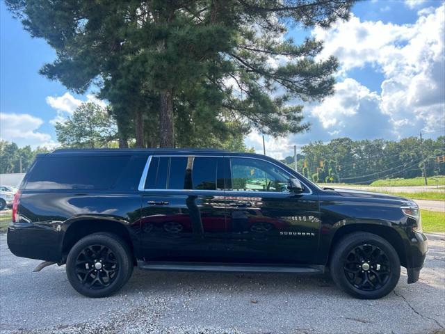 used 2015 Chevrolet Suburban car, priced at $14,499