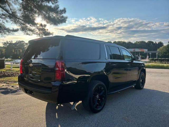 used 2015 Chevrolet Suburban car, priced at $14,499