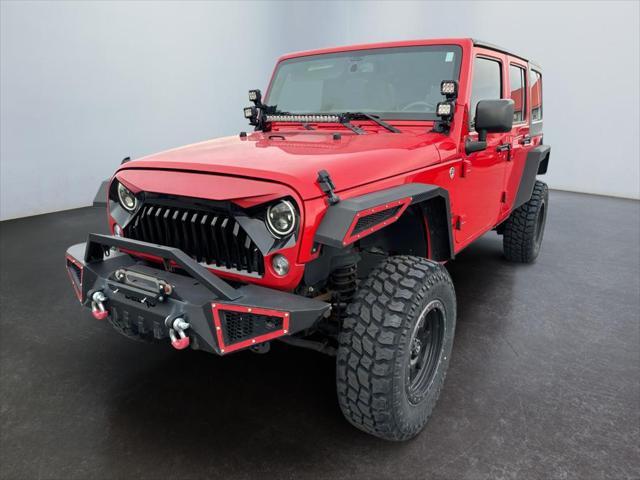 used 2015 Jeep Wrangler Unlimited car, priced at $18,995