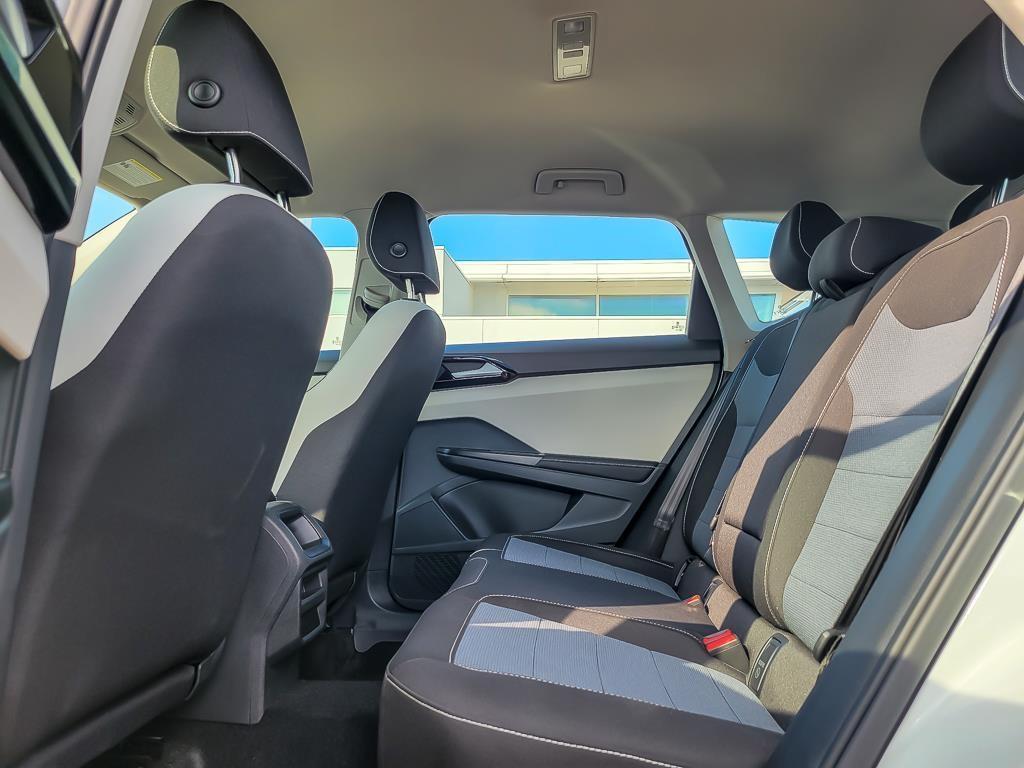 used 2025 Volkswagen Taos car, priced at $24,398