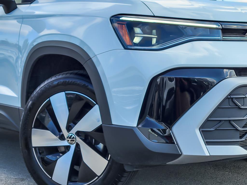 used 2025 Volkswagen Taos car, priced at $24,398