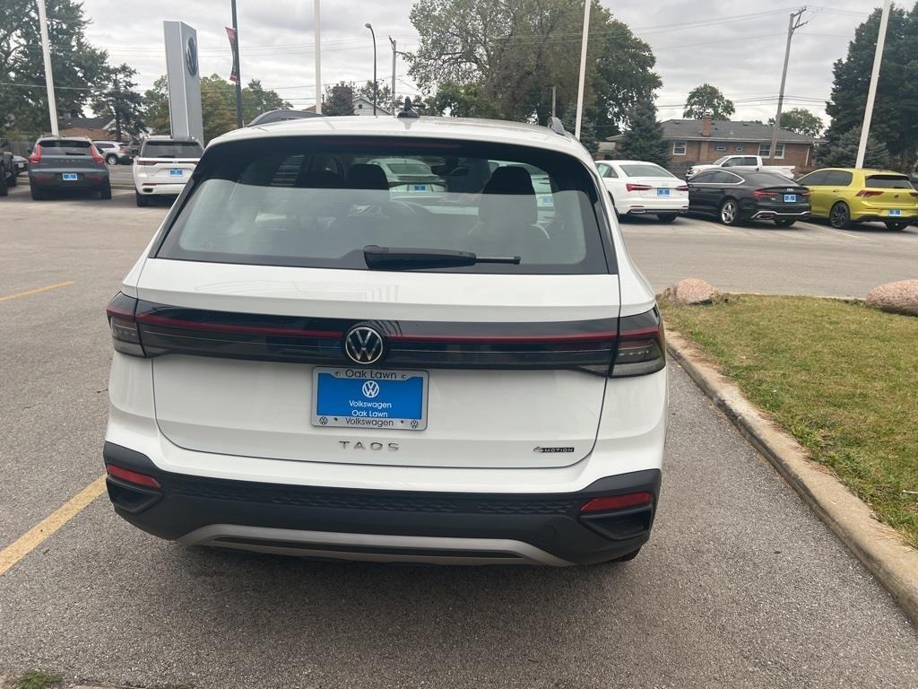 used 2025 Volkswagen Taos car, priced at $24,291