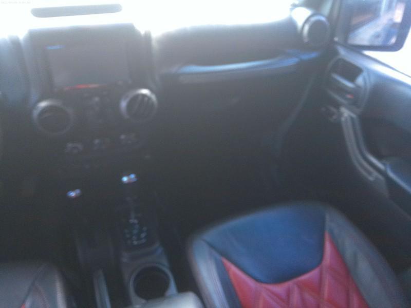 used 2015 Jeep Wrangler Unlimited car, priced at $16,998