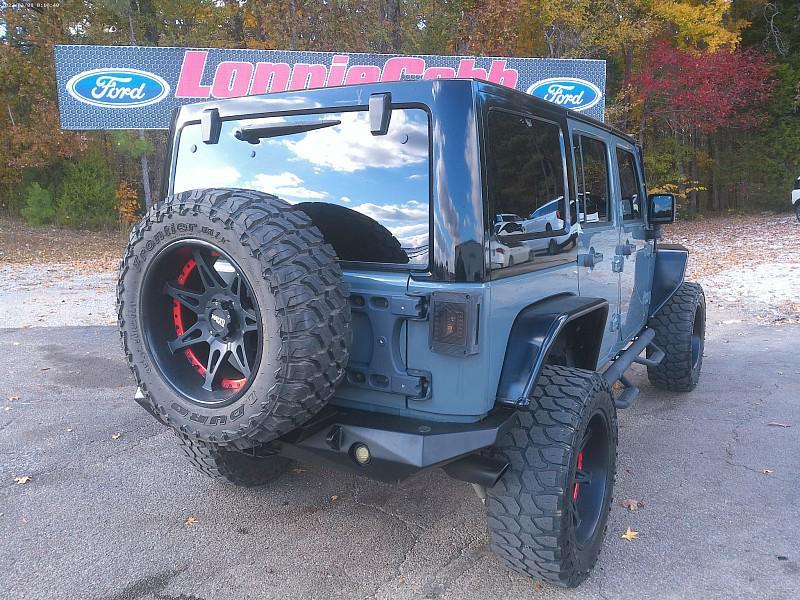 used 2015 Jeep Wrangler Unlimited car, priced at $16,998